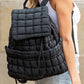 Black Solid Flapped Quilted Puffer Backpack