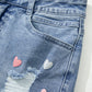 Beau Blue Shimmer Heart Pattern Distressed Denim Mini Skirt