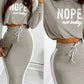 2 Pieces Outfits Letter Print Round Neck Long Sleeve Crop Top and Colorblock Print Drawstring Bodycon Skirt Set