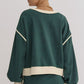 Evergreen Color Contrast Loose Pullover and Lace-up Waist Skort Set