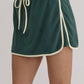 Evergreen Color Contrast Loose Pullover and Lace-up Waist Skort Set