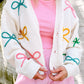 White Bowknot Drop Shoulder Knitted Button up Cardigan