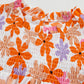 Orange Ruffled Sleeve Smocked Floral Top