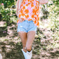 Orange Ruffled Sleeve Smocked Floral Top