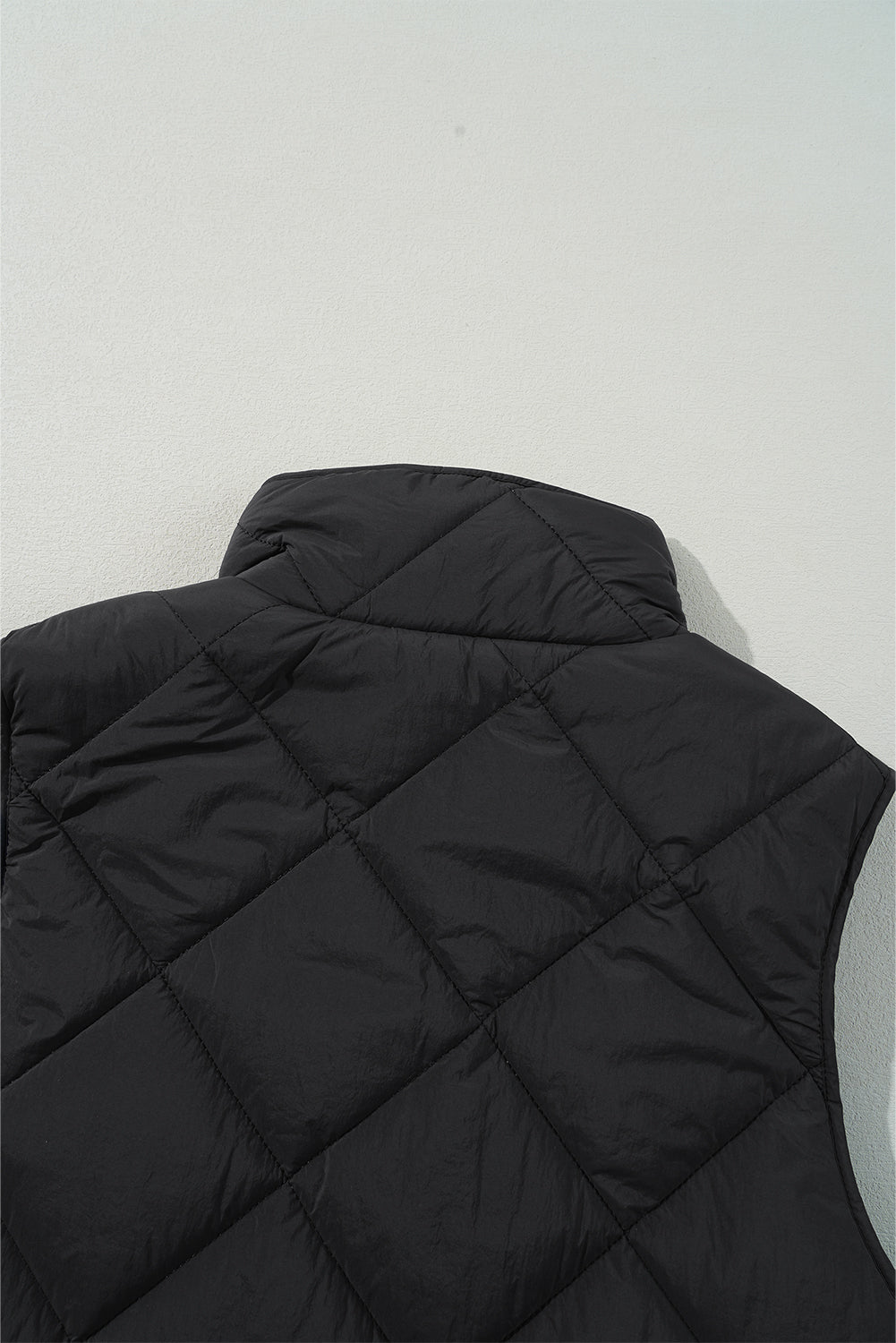 Black Quilted High Neck Button Up Pocket Vest Coat