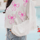 White Bowknot Graphic Raw Hem Loose Sweatshirt